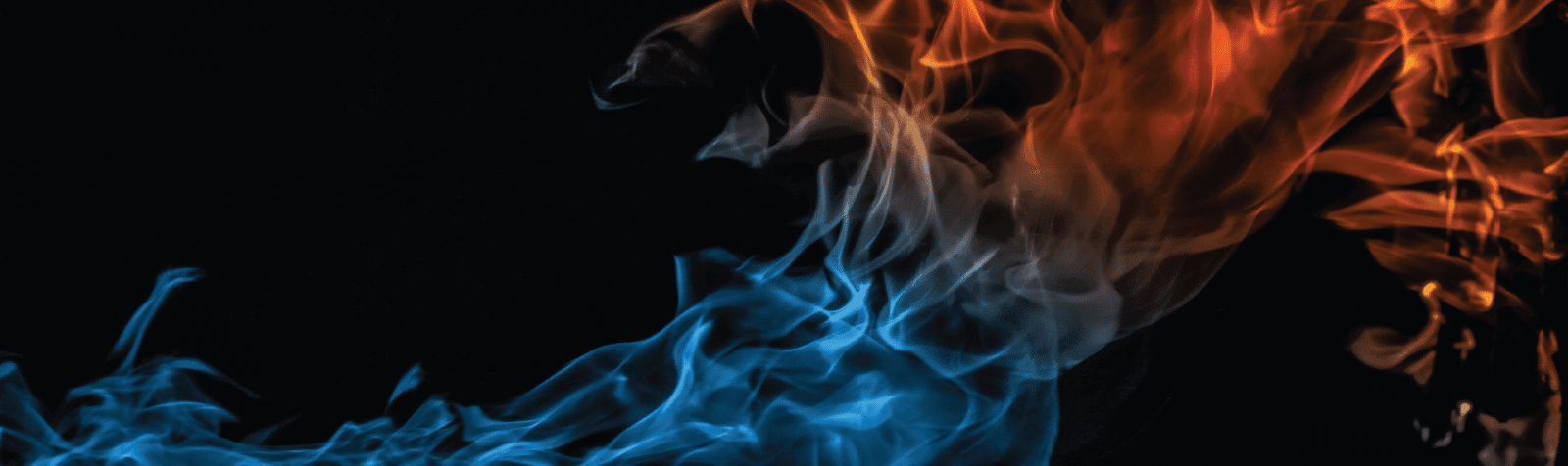 black background with smoke - smoke is a gradient from blue (left side) to red (right side)