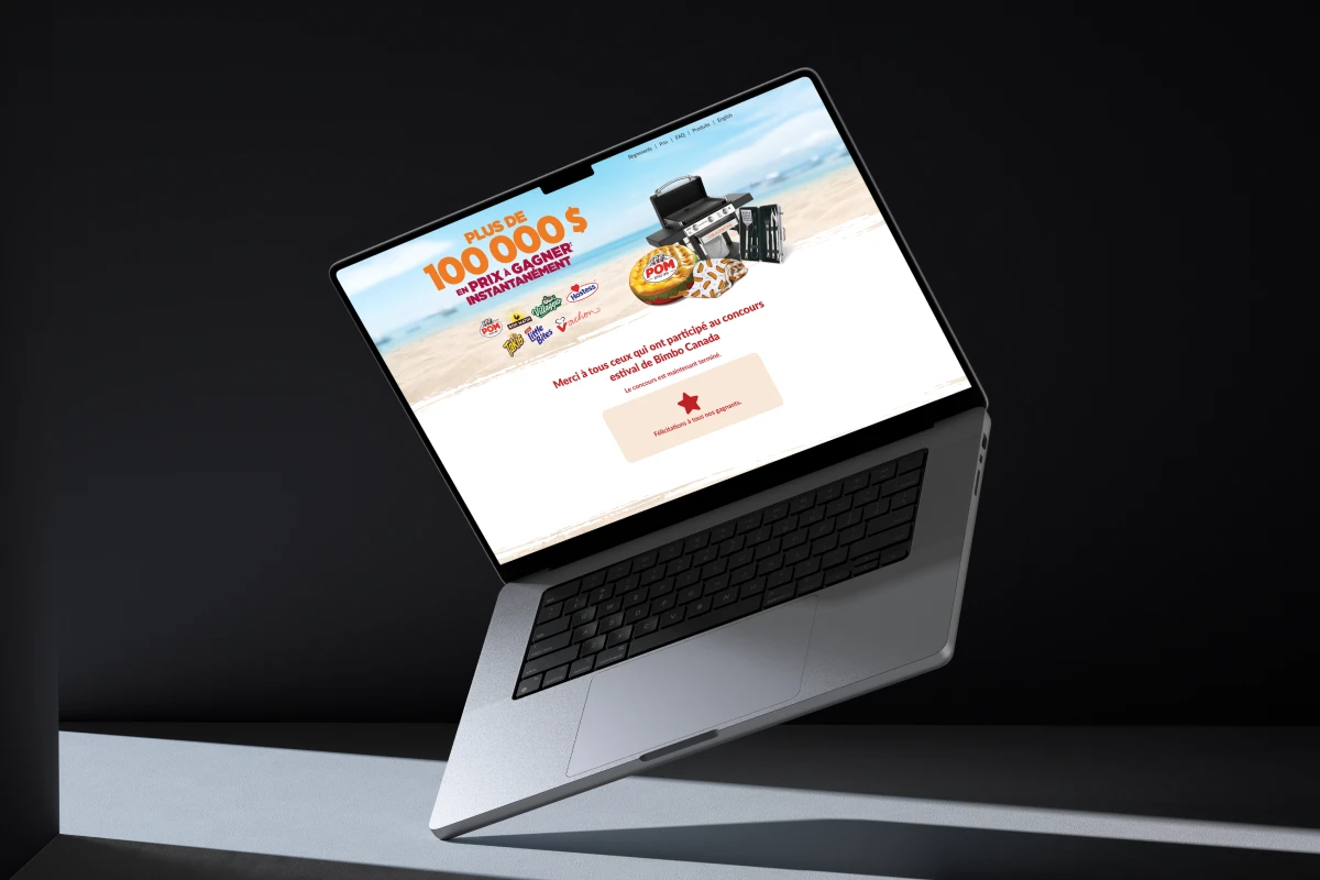 Laptop on angle with a website on the screen showing a digital contest developed by My Brother Darryl